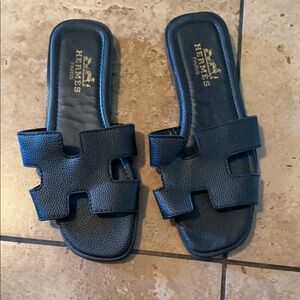 Hermès Black Leather Slide Sandals